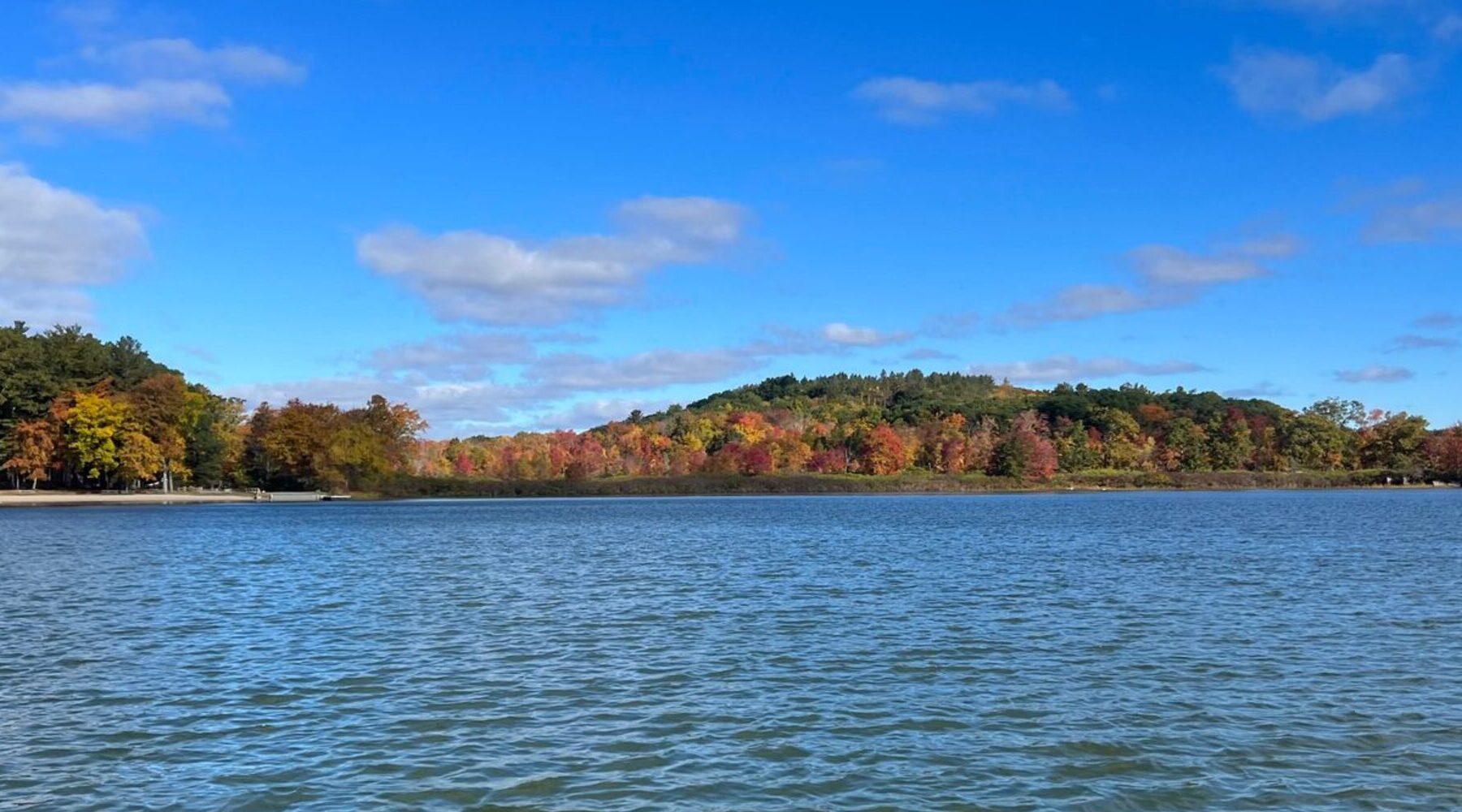 Fall foliage over Highland Lake