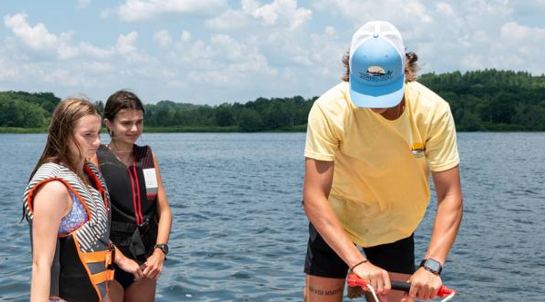 Kids enjoying a boat on Woodridge Lake in Litchfield